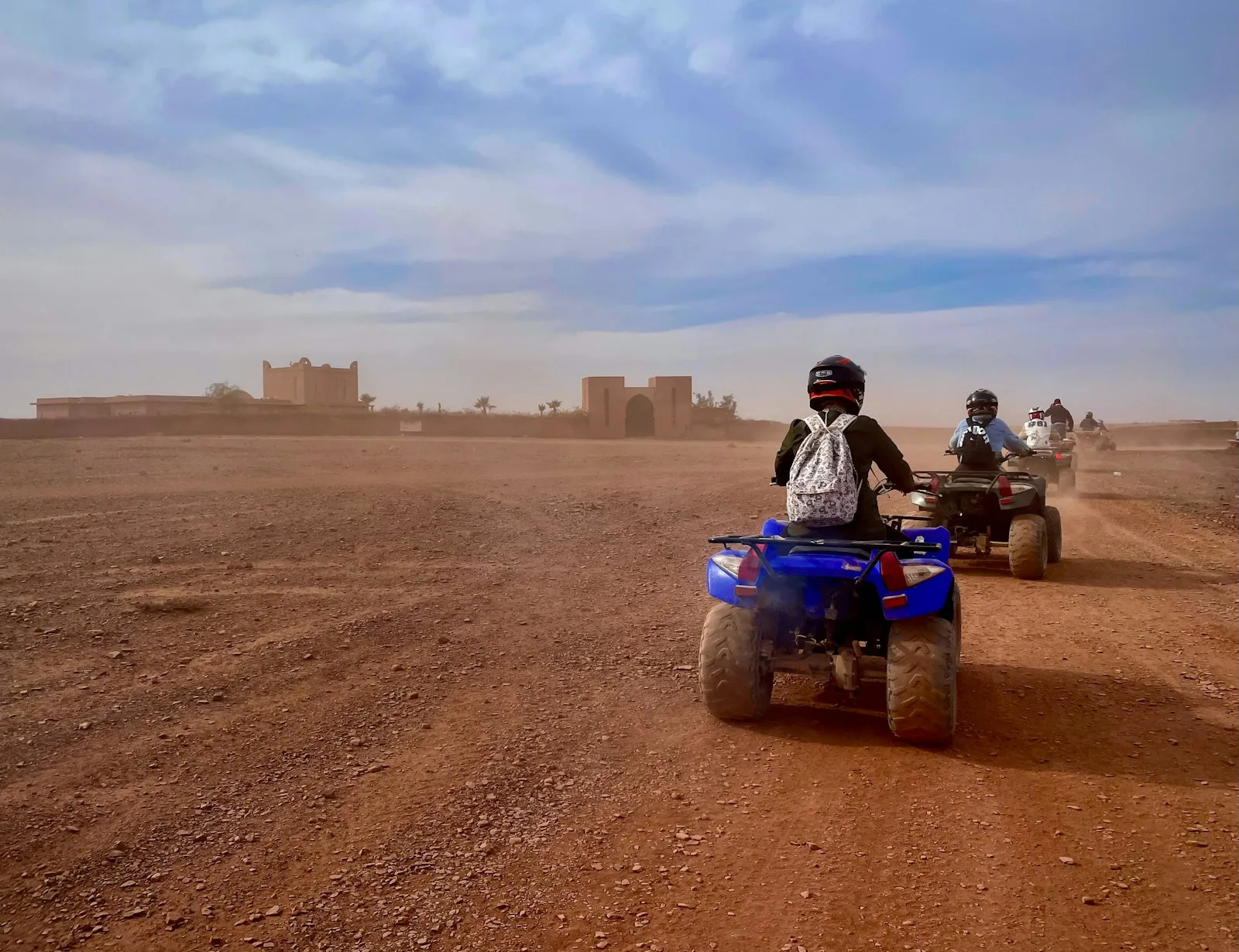 Quad riders on a rocky desert track in Morocco