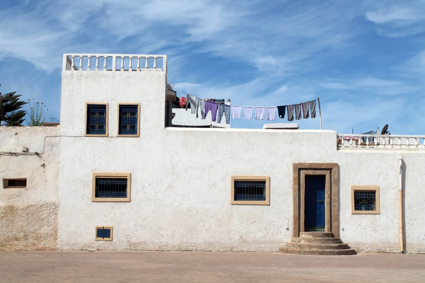 Traditional white buildings and a lane in Rabat